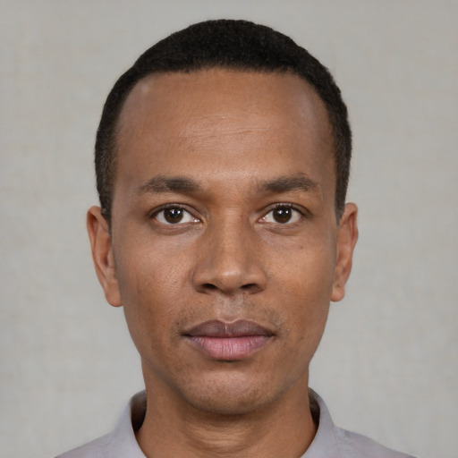 Neutral black young-adult male with short  black hair and brown eyes