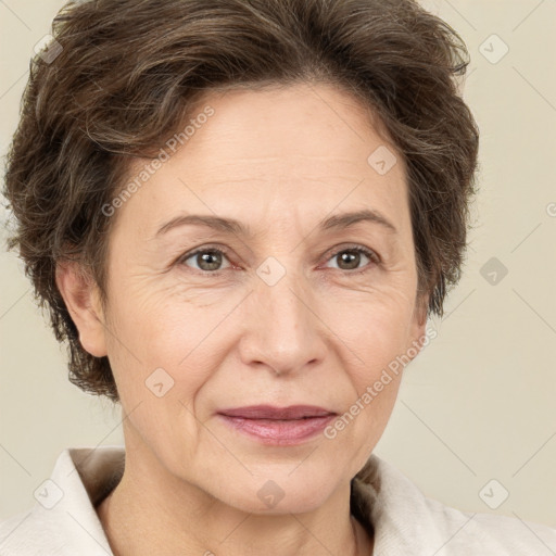 Joyful white adult female with short  brown hair and brown eyes