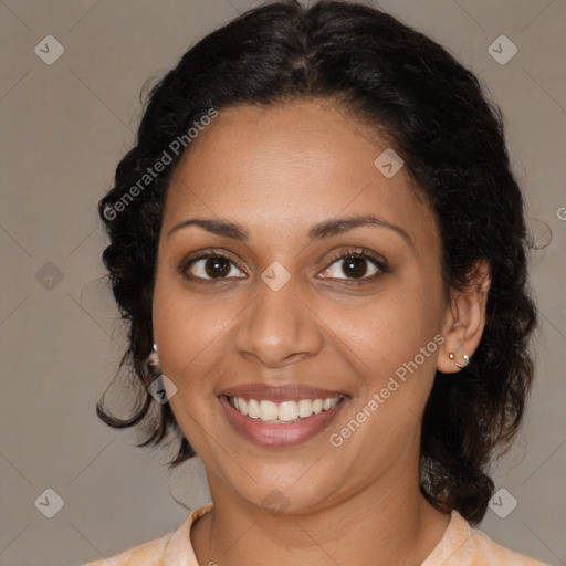 Joyful black young-adult female with medium  brown hair and brown eyes