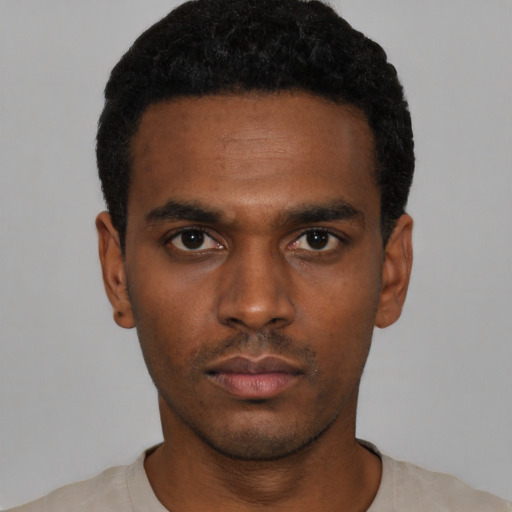 Neutral black young-adult male with short  black hair and brown eyes