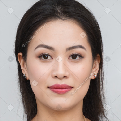 Joyful asian young-adult female with long  brown hair and brown eyes