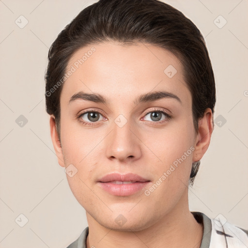 Neutral white young-adult female with short  brown hair and brown eyes