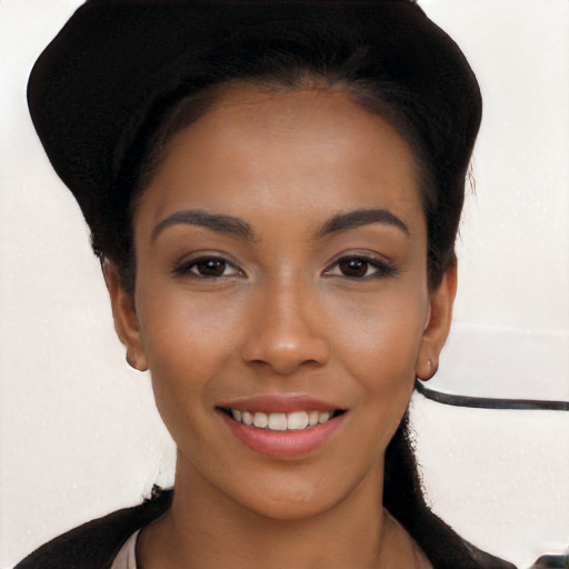 Joyful white young-adult female with long  black hair and brown eyes