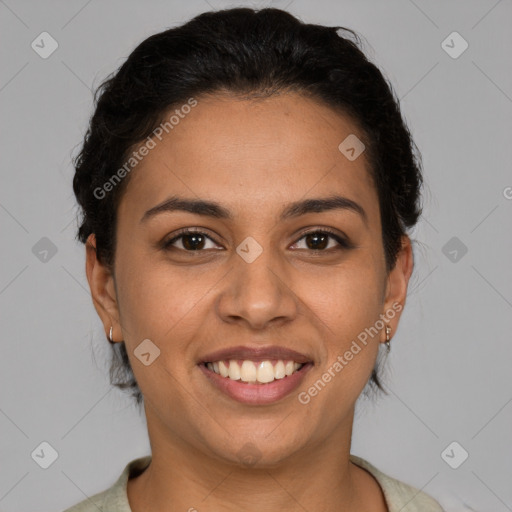 Joyful latino young-adult female with short  brown hair and brown eyes