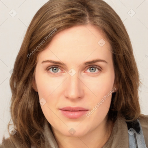 Joyful white young-adult female with long  brown hair and blue eyes