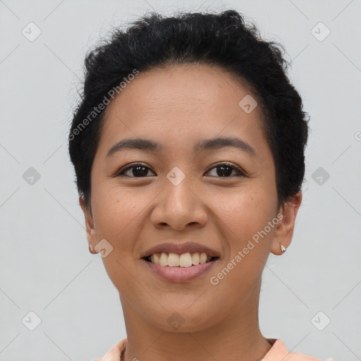 Joyful asian young-adult female with short  brown hair and brown eyes