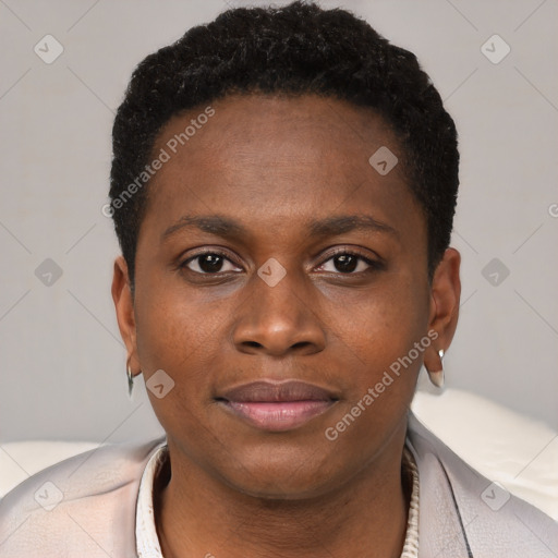 Joyful black young-adult female with short  brown hair and brown eyes