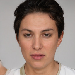 Neutral white adult female with short  brown hair and brown eyes