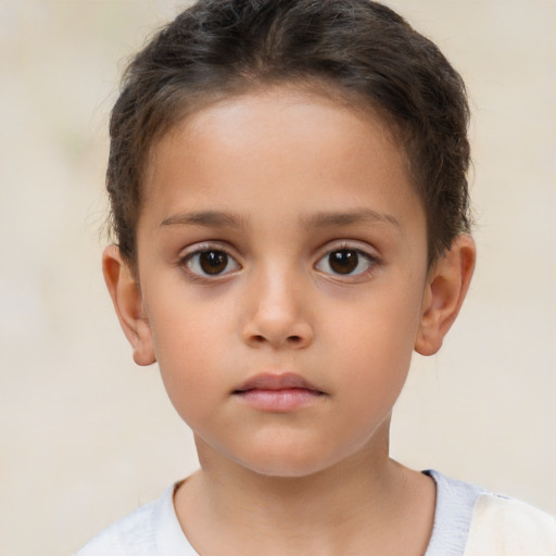 Neutral white child female with short  brown hair and brown eyes