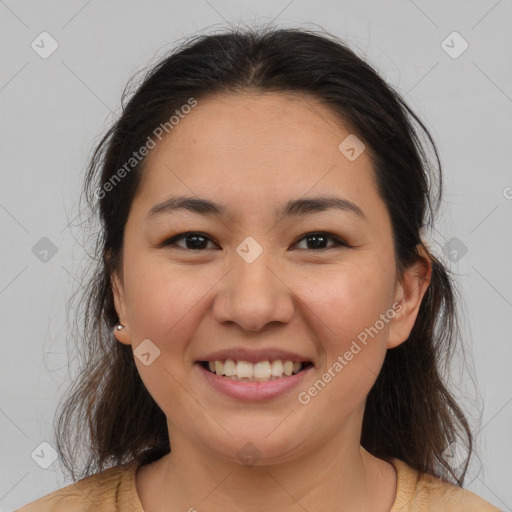 Joyful white young-adult female with medium  brown hair and brown eyes