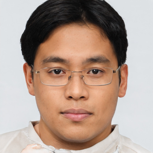 Neutral asian young-adult male with short  brown hair and brown eyes