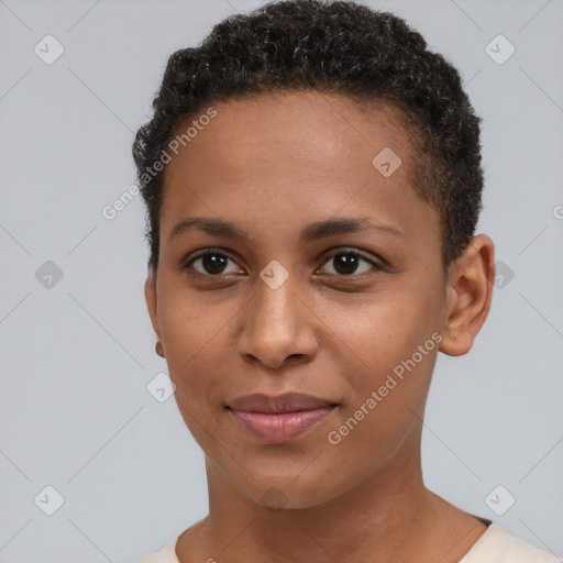 Joyful black young-adult female with short  brown hair and brown eyes