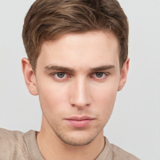 Neutral white young-adult male with short  brown hair and grey eyes