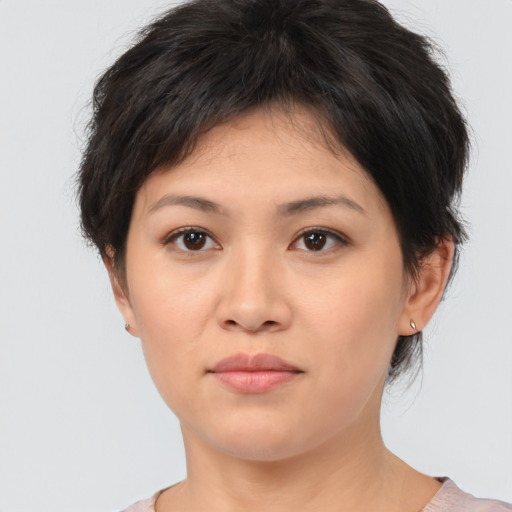 Neutral asian young-adult female with medium  brown hair and brown eyes