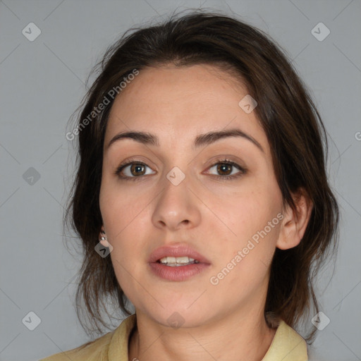 Neutral white young-adult female with medium  brown hair and brown eyes