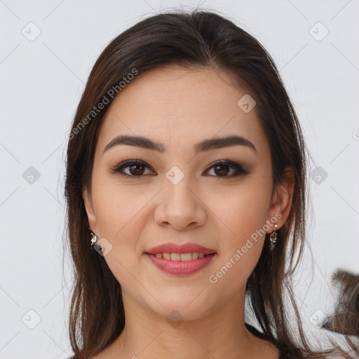 Joyful latino young-adult female with medium  brown hair and brown eyes