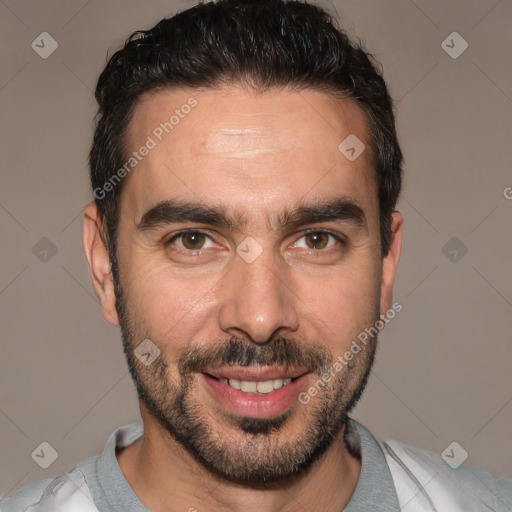 Joyful white adult male with short  black hair and brown eyes