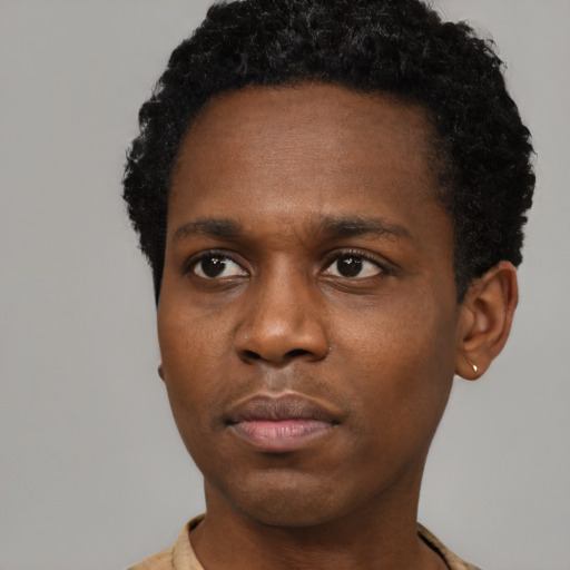 Neutral black young-adult male with short  brown hair and brown eyes