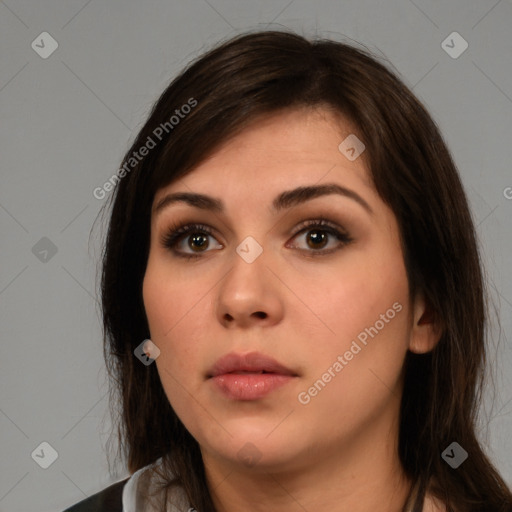 Neutral white young-adult female with long  brown hair and brown eyes