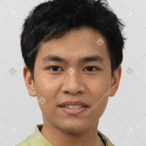 Joyful asian young-adult male with short  brown hair and brown eyes