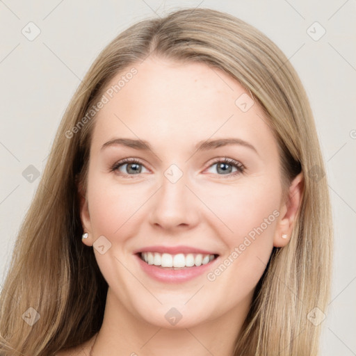 Joyful white young-adult female with long  brown hair and grey eyes