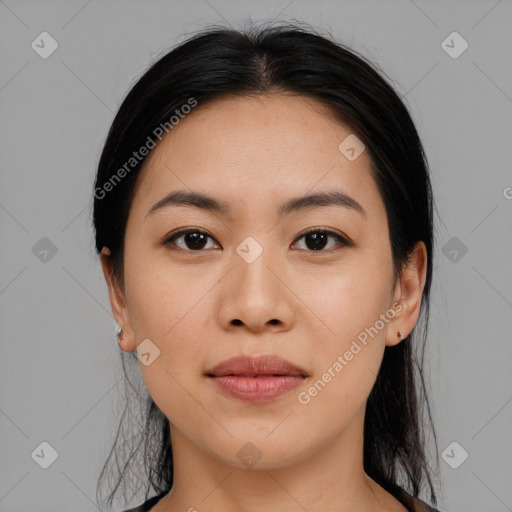 Joyful asian young-adult female with medium  black hair and brown eyes