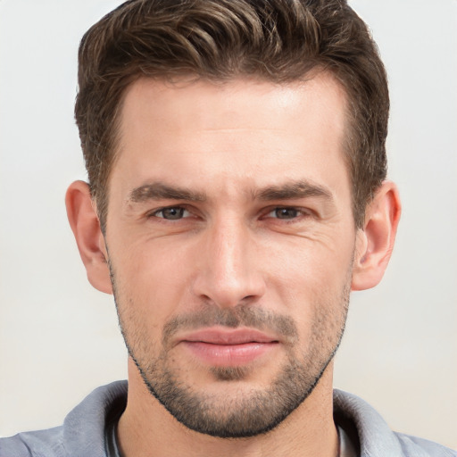 Neutral white young-adult male with short  brown hair and grey eyes