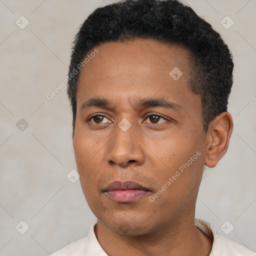 Neutral black young-adult male with short  black hair and brown eyes