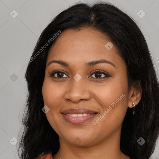 Joyful latino young-adult female with long  brown hair and brown eyes