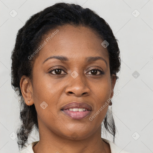 Joyful black young-adult female with medium  brown hair and brown eyes