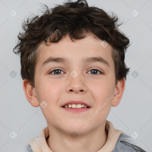 Joyful white child male with short  brown hair and brown eyes