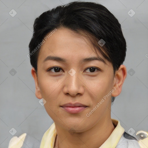 Joyful asian young-adult female with short  brown hair and brown eyes