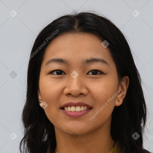 Joyful asian young-adult female with long  brown hair and brown eyes