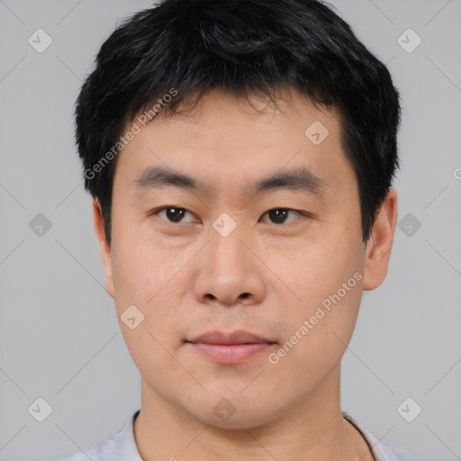 Neutral asian young-adult male with short  black hair and brown eyes