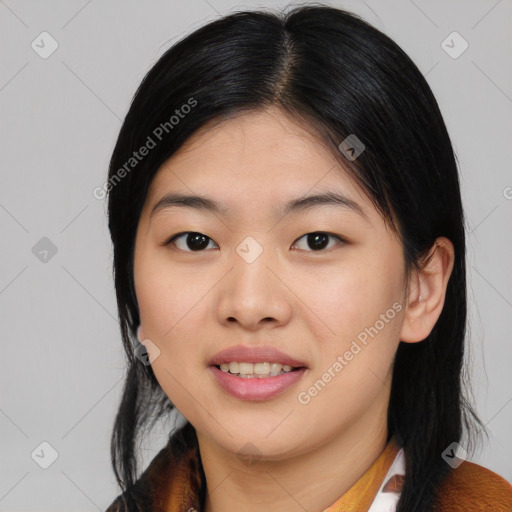 Joyful asian young-adult female with medium  black hair and brown eyes