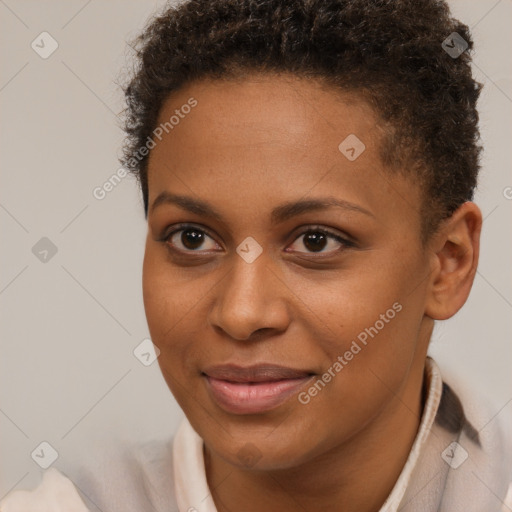 Joyful black young-adult female with short  brown hair and brown eyes