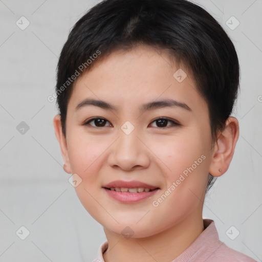 Joyful asian young-adult female with short  brown hair and brown eyes