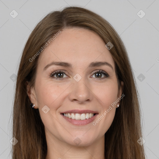 Joyful white young-adult female with long  brown hair and grey eyes