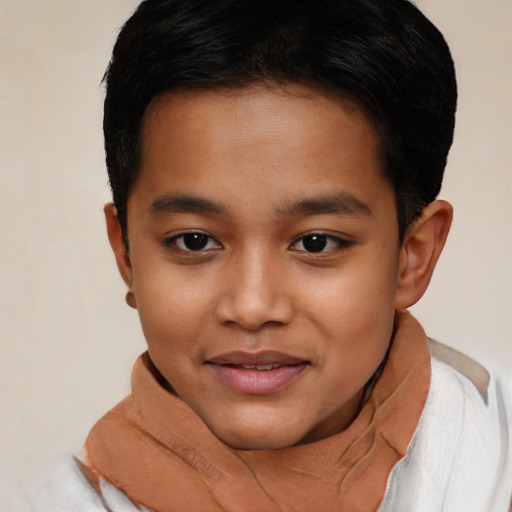 Joyful latino young-adult male with short  brown hair and brown eyes