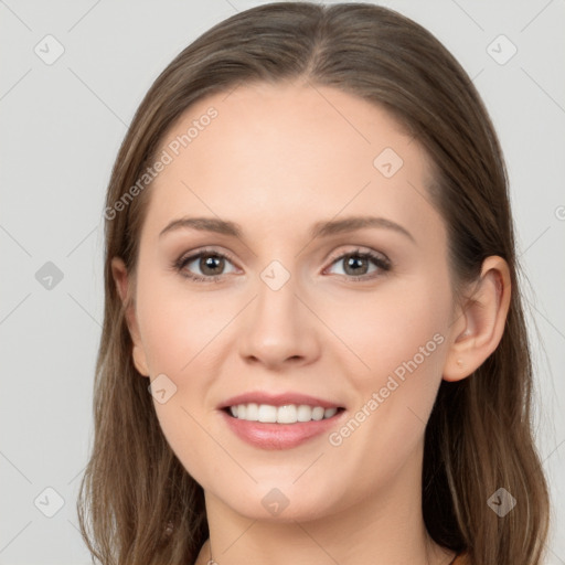 Joyful white young-adult female with long  brown hair and grey eyes