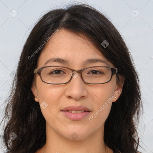 Joyful white adult female with long  brown hair and brown eyes