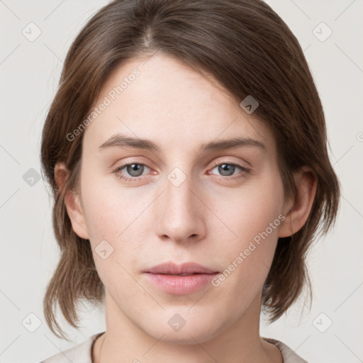 Neutral white young-adult female with medium  brown hair and grey eyes