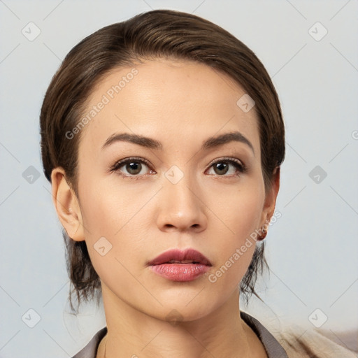 Neutral white young-adult female with short  brown hair and brown eyes