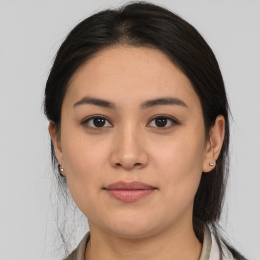 Joyful white young-adult female with medium  brown hair and brown eyes