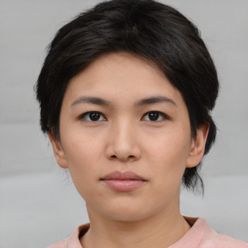 Neutral asian young-adult female with medium  black hair and brown eyes