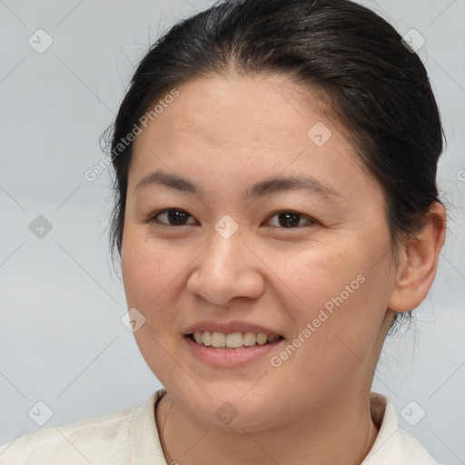 Joyful white young-adult female with medium  brown hair and brown eyes