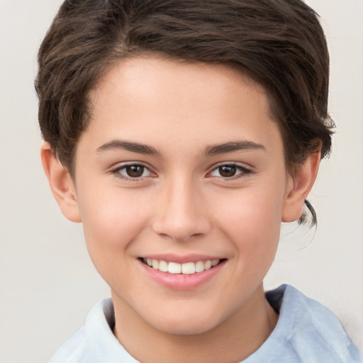 Joyful white child female with short  brown hair and brown eyes