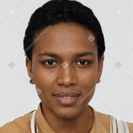 Joyful black young-adult female with short  black hair and brown eyes