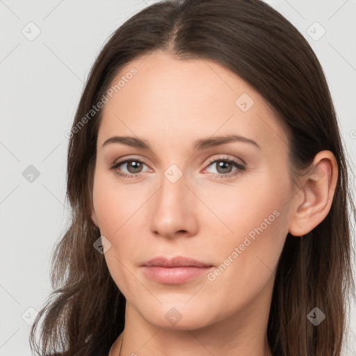 Neutral white young-adult female with long  brown hair and brown eyes