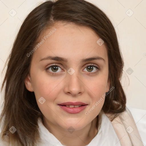 Joyful white young-adult female with medium  brown hair and green eyes